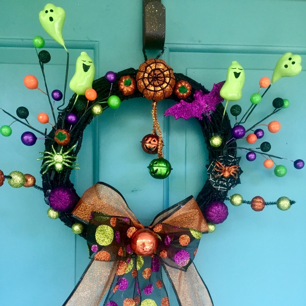 Fun, happy ghost wreath. Lime green, purple, orange and black.